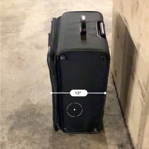 TUMI Check In Suitcase MSRP $1500.00